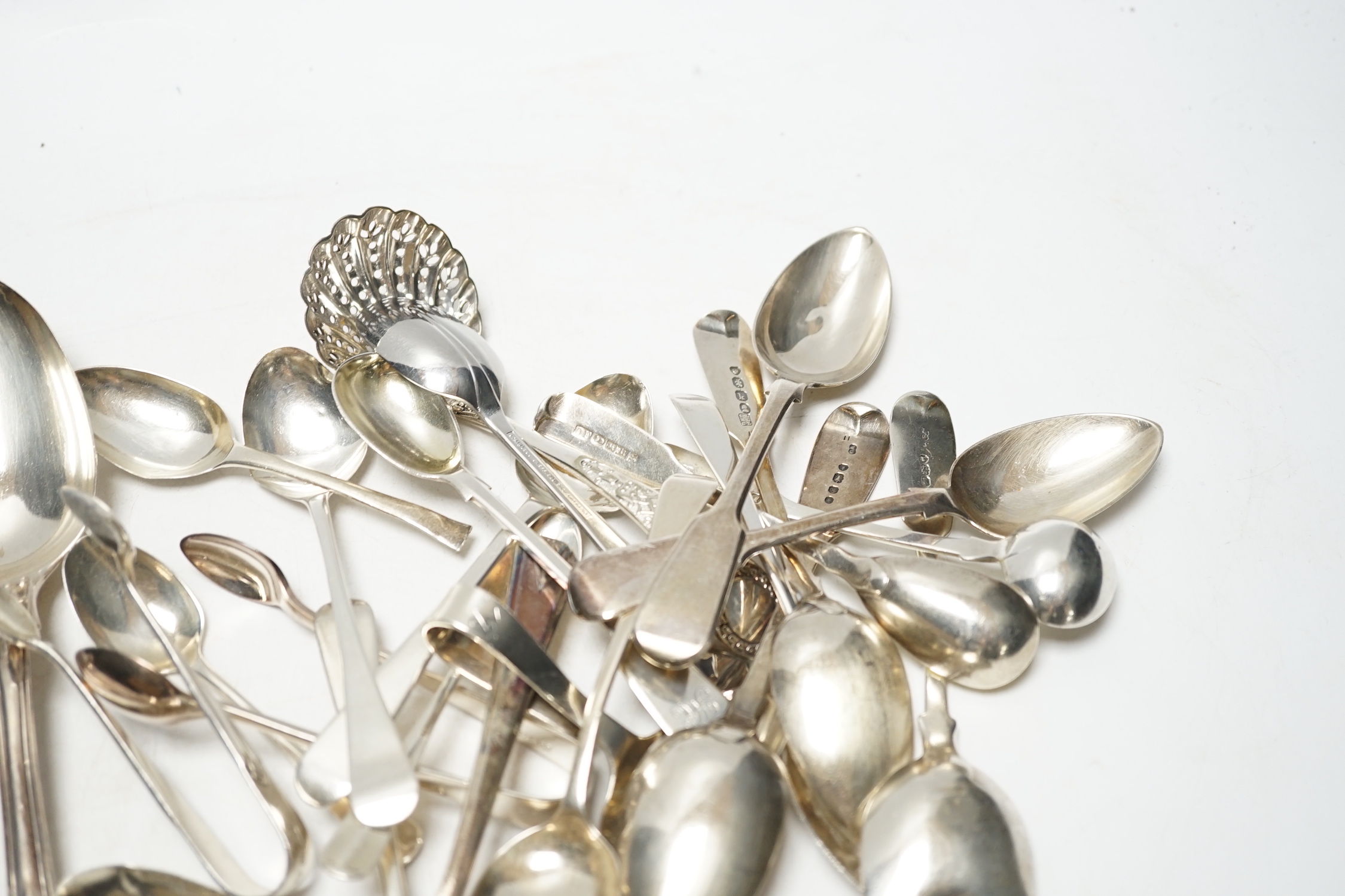 Sundry silver cutlery, including a pair of Victorian Kings pattern table forks and a matching tablespoon, London, 1845, a William IV fiddle pattern sauce ladle and various salt, tea and coffee spoons, 21.9oz and three pl